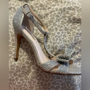 Sparkly silver heels. Good condition.